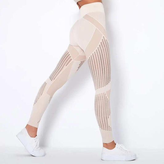 Beige seamless high waist hollow out fitness leggings for women, side view, white shoes