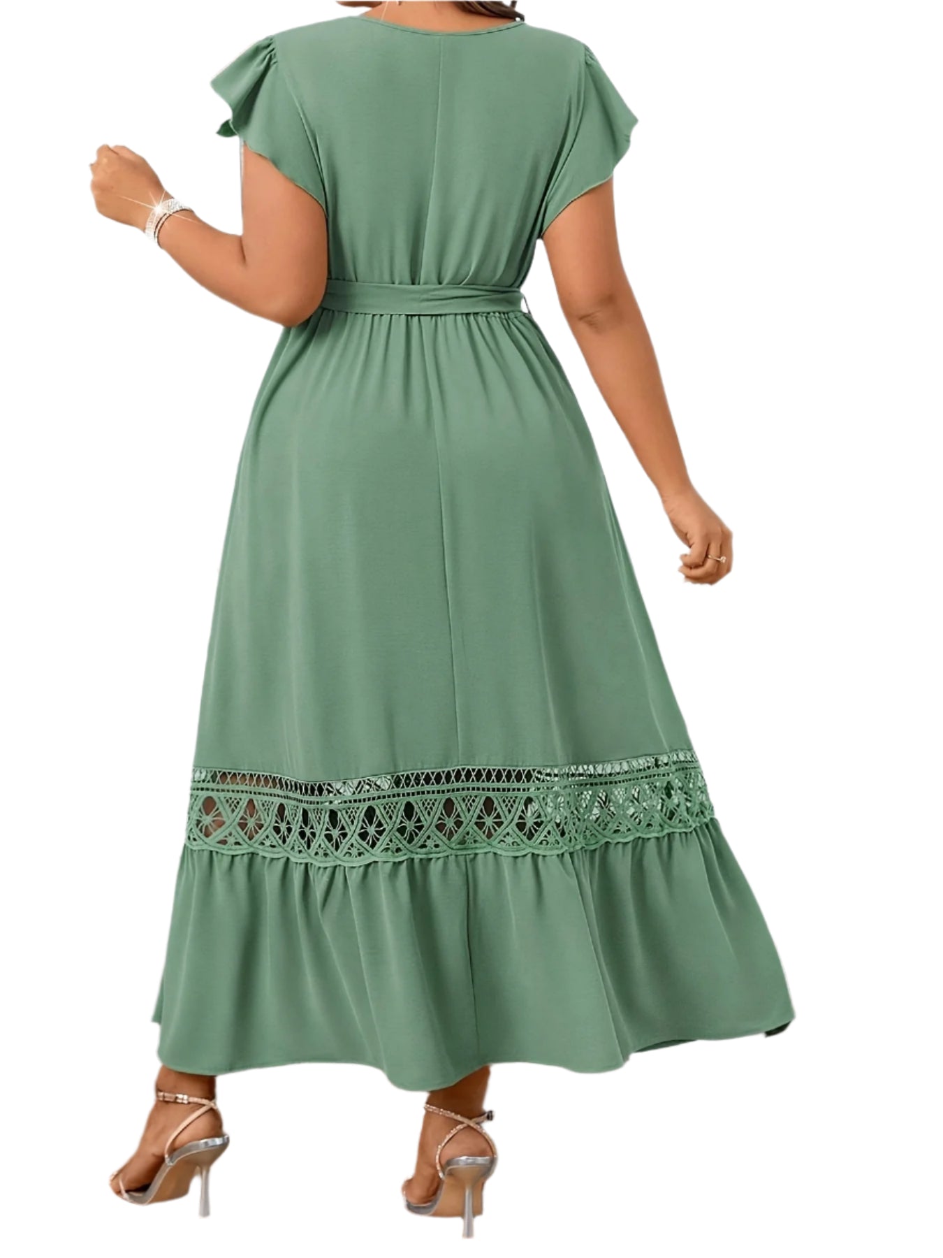 Back view of the Fashion Casual Temperament Dress with exaggerated ruffle details and trapeze hem.