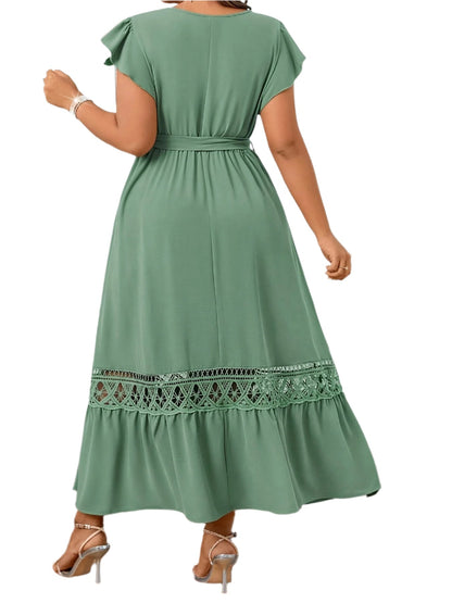 Back view of the Fashion Casual Temperament Dress with exaggerated ruffle details and trapeze hem.