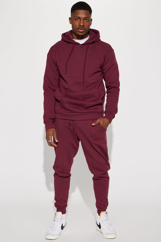 https://cdn.shopify.com/s/files/1/0293/9277/products/12-30-22Studio5_RT_SR_11-10-28_34_NMKT40418_Burgundy_2174_SG.jpg?v=1672791486