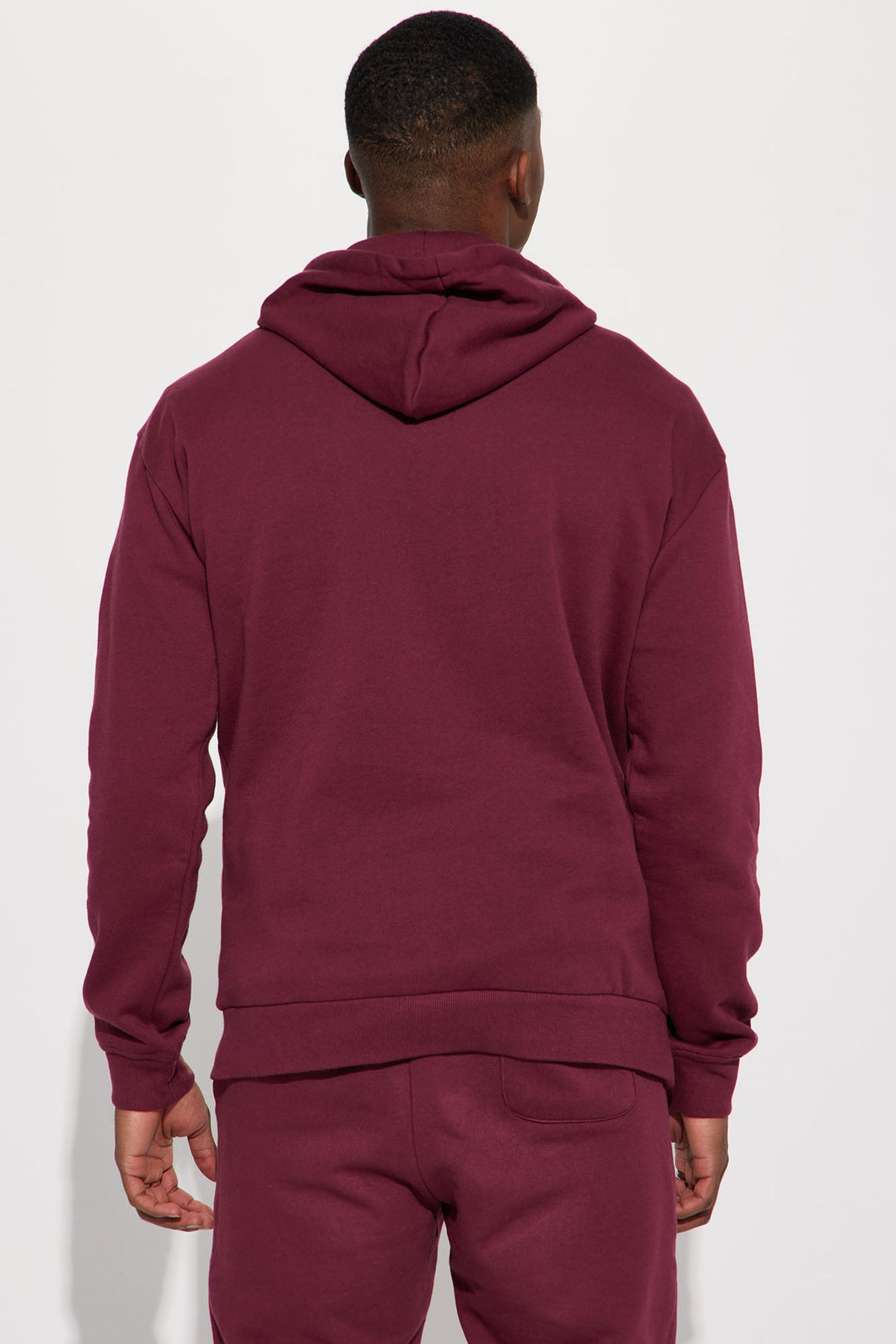 https://cdn.shopify.com/s/files/1/0293/9277/products/12-30-22Studio5_RT_SR_11-11-53_34_NMKT40418_Burgundy_2182_SG.jpg?v=1672791486
