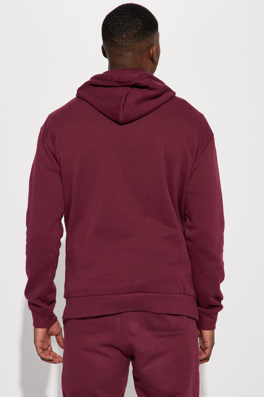 https://cdn.shopify.com/s/files/1/0293/9277/products/12-30-22Studio5_RT_SR_11-11-53_34_NMKT40418_Burgundy_2182_SG.jpg?v=1672791486