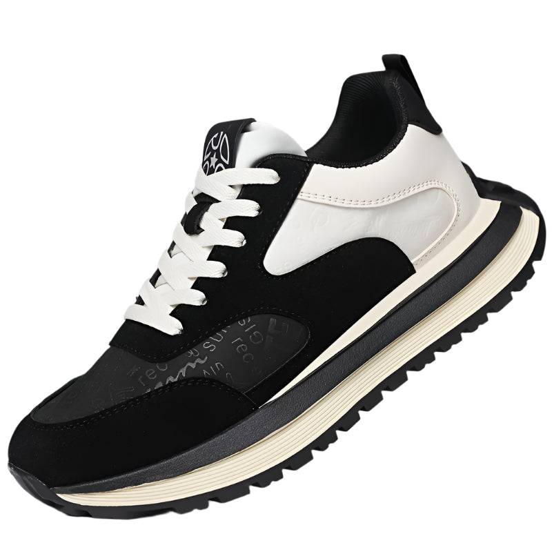 Side profile of Men's Casual Sneakers - Comfortable, Non-Slip, Lace-Up Shoes highlighting the sleek design and materials.