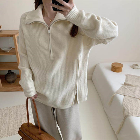 Loose long sleeved sweater with slit hem