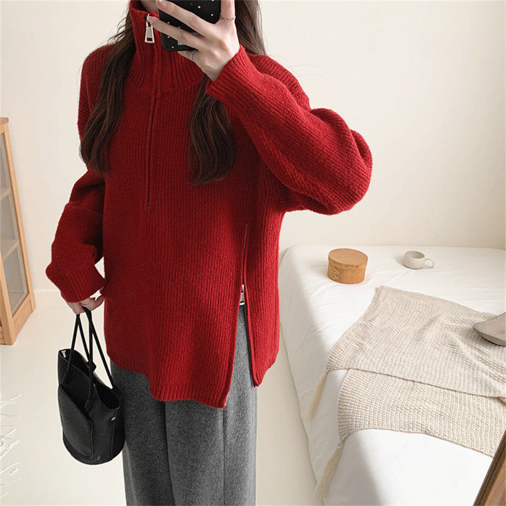 Loose long sleeved sweater with slit hem