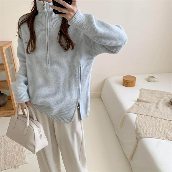 Loose long sleeved sweater with slit hem