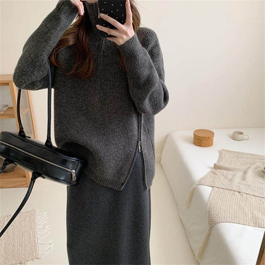 Loose long sleeved sweater with slit hem