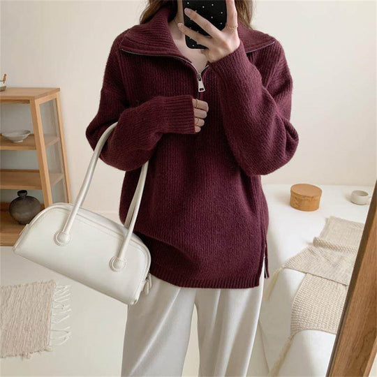Loose long sleeved sweater with slit hem