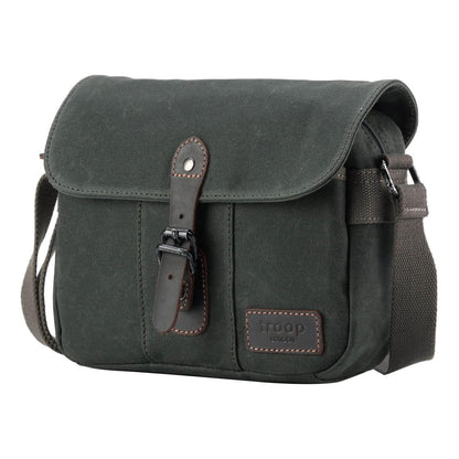 Detail image of the TRP0440 Heritage Across body Bag's adjustable strap and magnetic button closure.