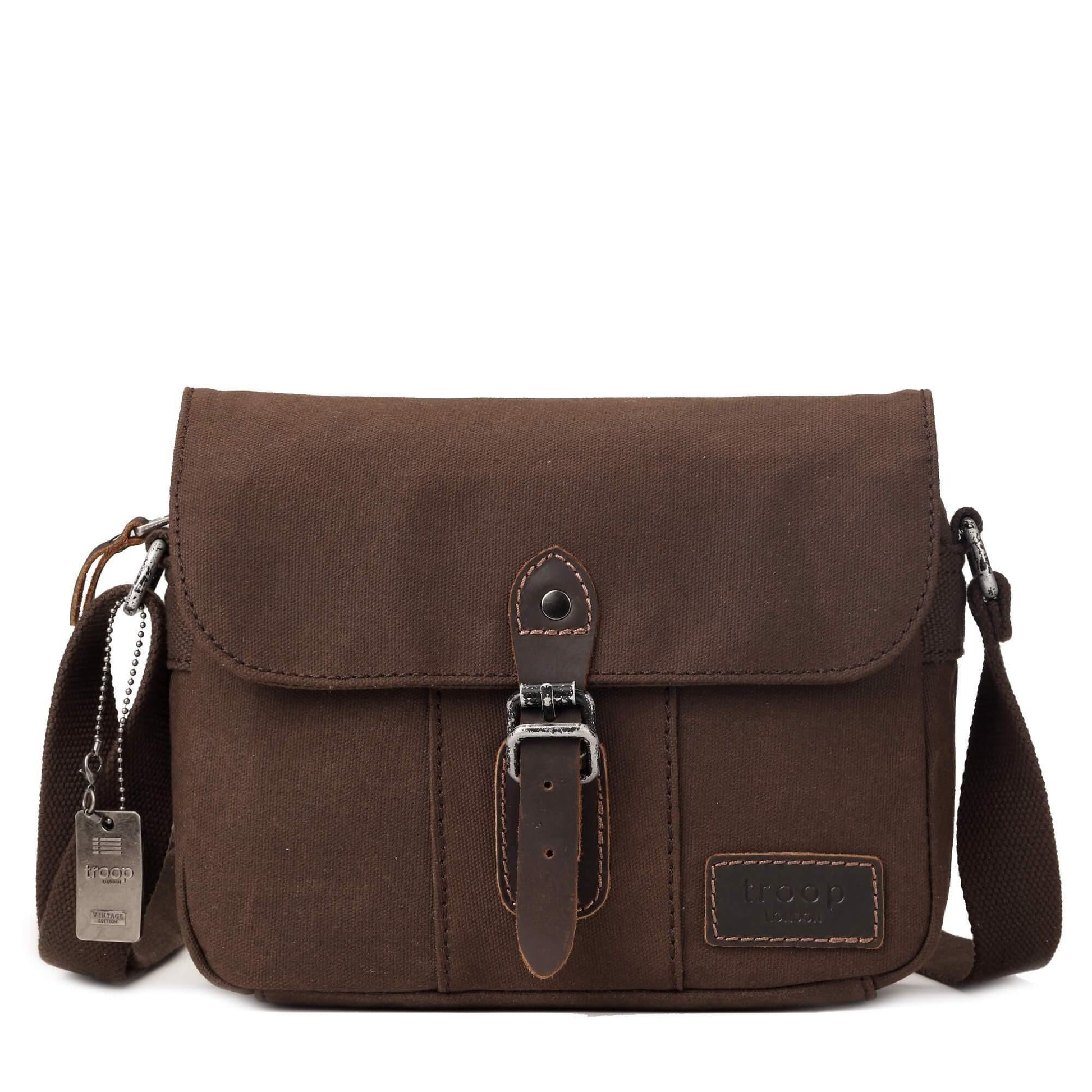 Lifestyle image of the TRP0440 Heritage Across body Bag styled as a small travel bag in an urban setting.