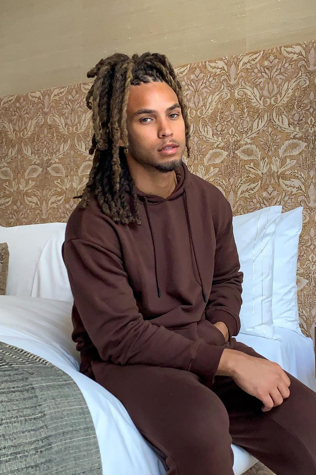 https://cdn.shopify.com/s/files/1/0293/9277/products/TysonHoodie-Chocolate_MER.jpg?v=1709078350