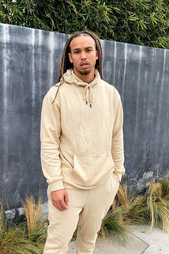https://cdn.shopify.com/s/files/1/0293/9277/products/TysonHoodie-Tan_mer_c6a416ab-3610-4c03-92e0-3f0fad02fe8c.jpg?v=1689881404
