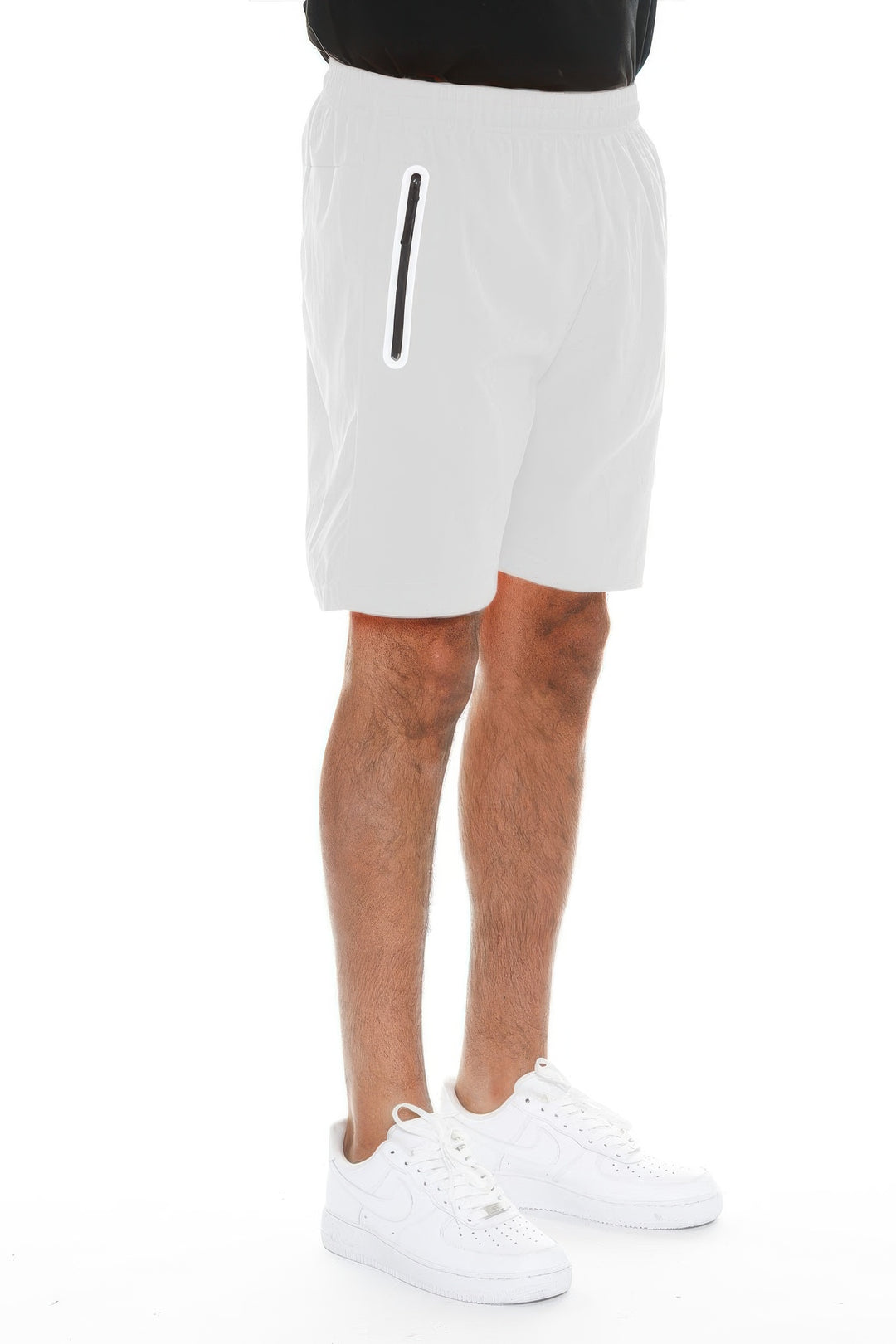 White shorts worn by a person on a white background