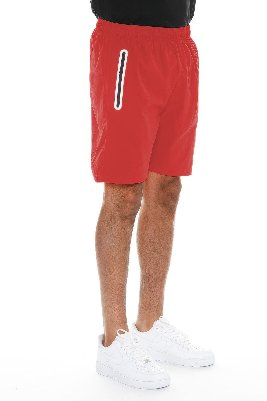 Red shorts with a white stripe worn by a person on a white background