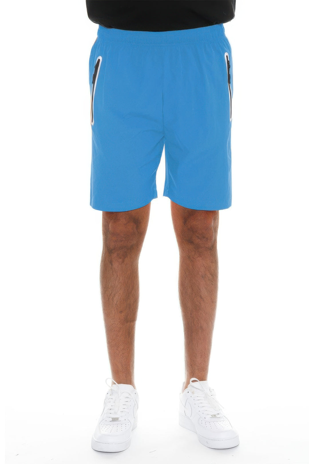 Blue shorts worn by a person on a white background