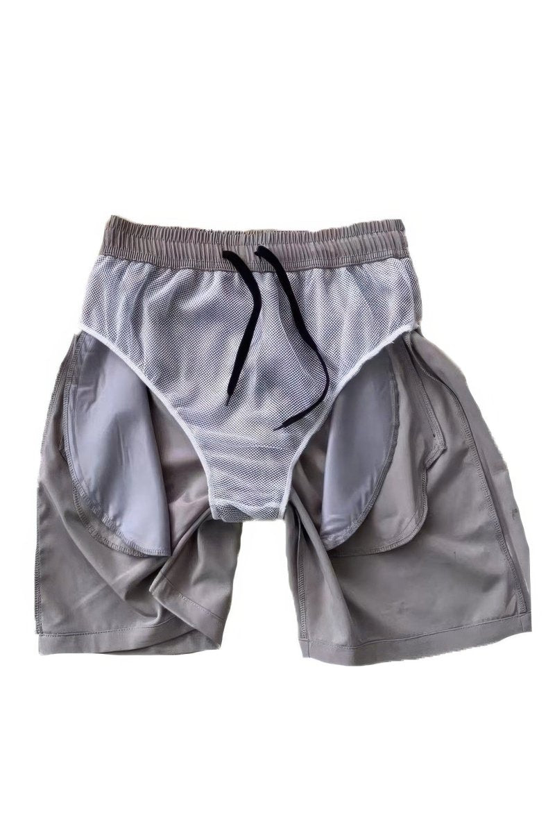 Gray athletic shorts with a drawstring on a white background