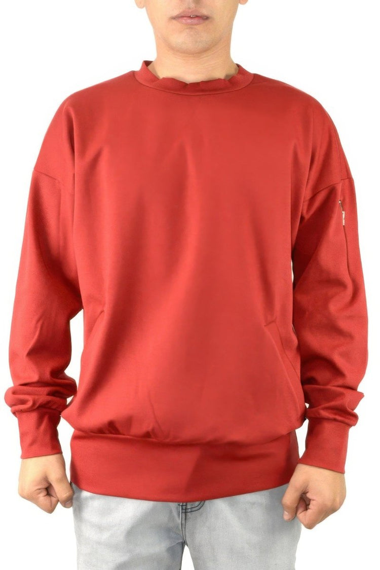Red sweatshirt worn by a person on a white background