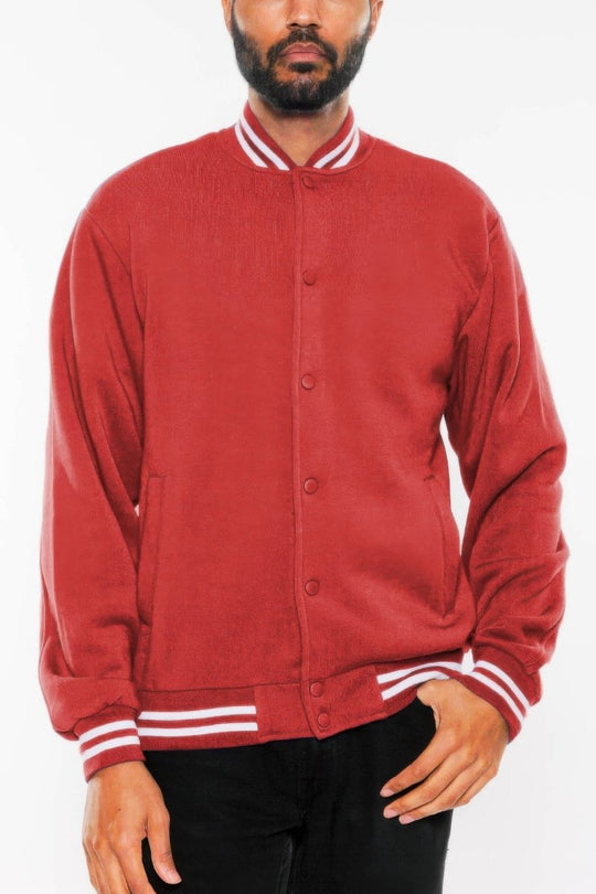 Red varsity jacket with white accents worn by a person on a white background