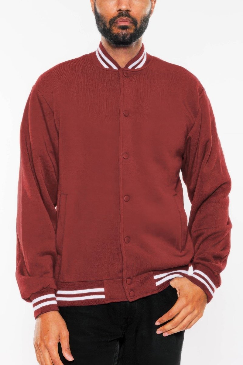 Maroon varsity jacket with white accents worn by a person on a white background