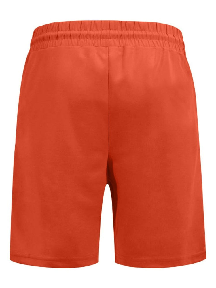 Orange shorts on a white background