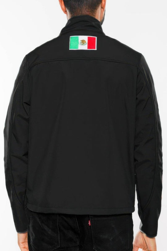 Black jacket with a Mexican flag patch on the back against a white background