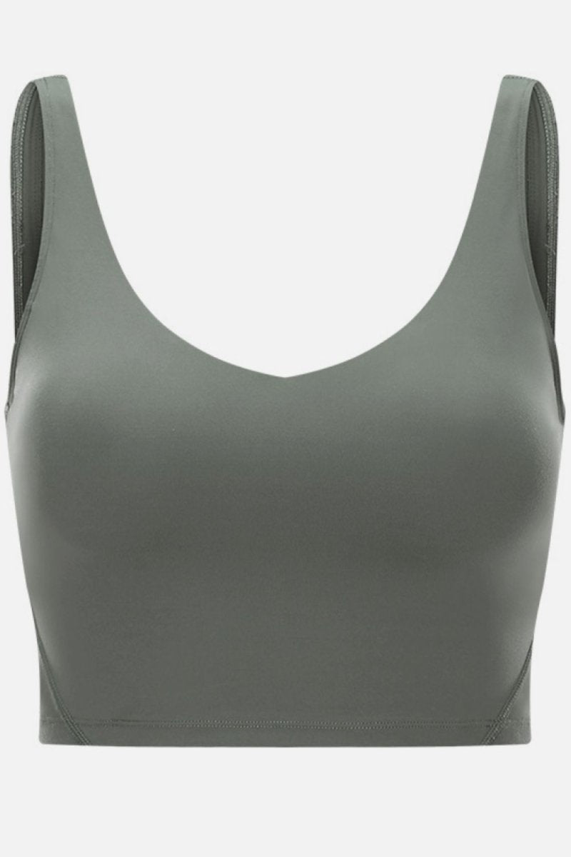 Gray sports bra on a white background