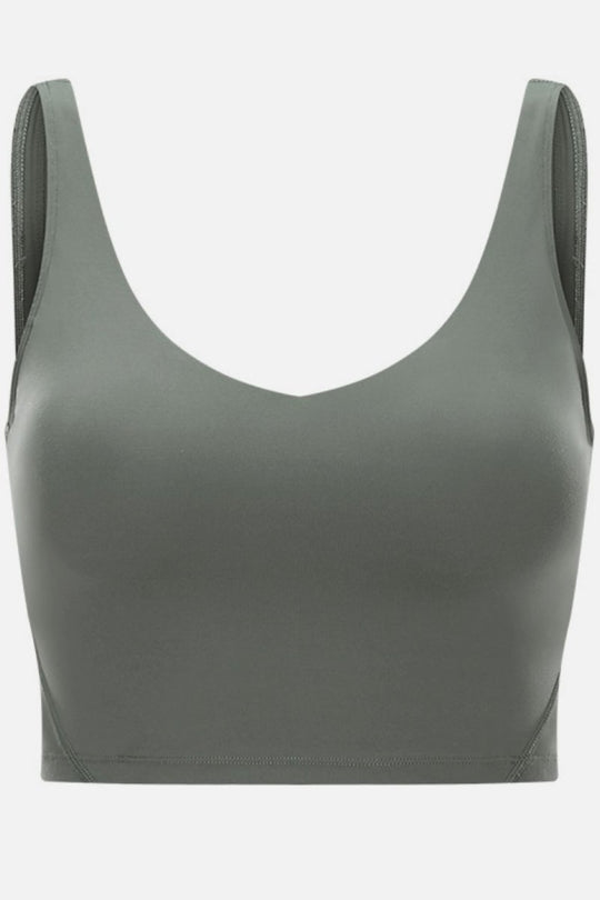 Gray sports bra on a white background