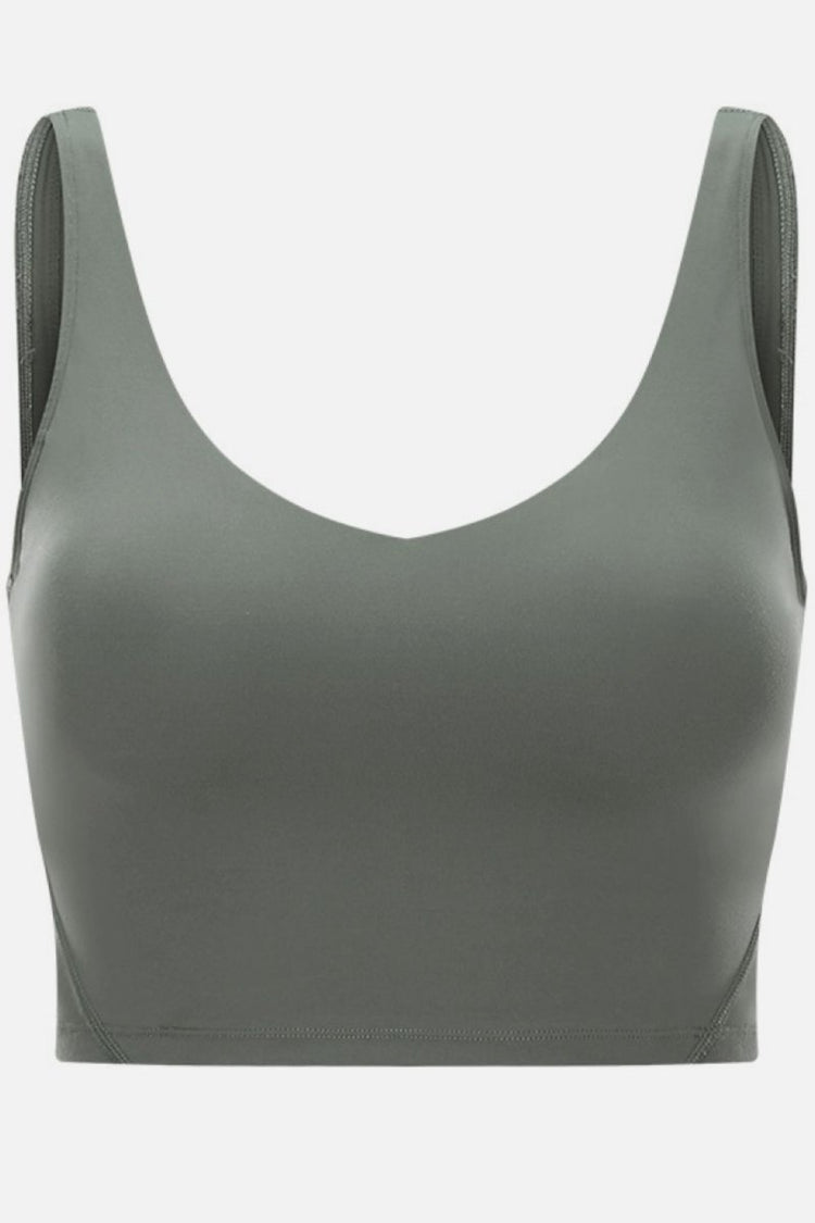 Gray sports bra on a white background