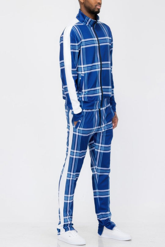 Person wearing a blue and white plaid outfit on a white background