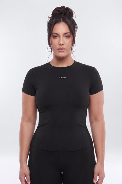 Woman wearing a black t-shirt with &