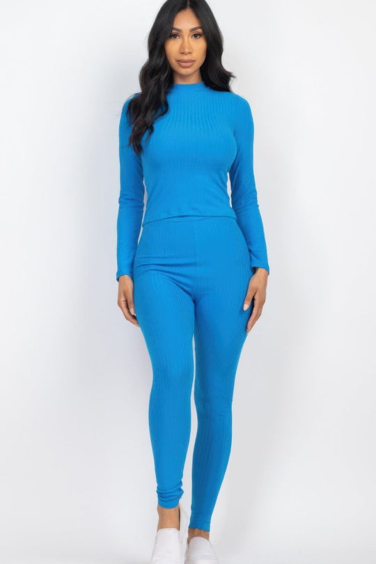 Woman wearing a blue outfit on a white background