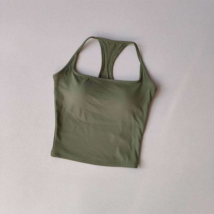 Green tank top on a light gray background
