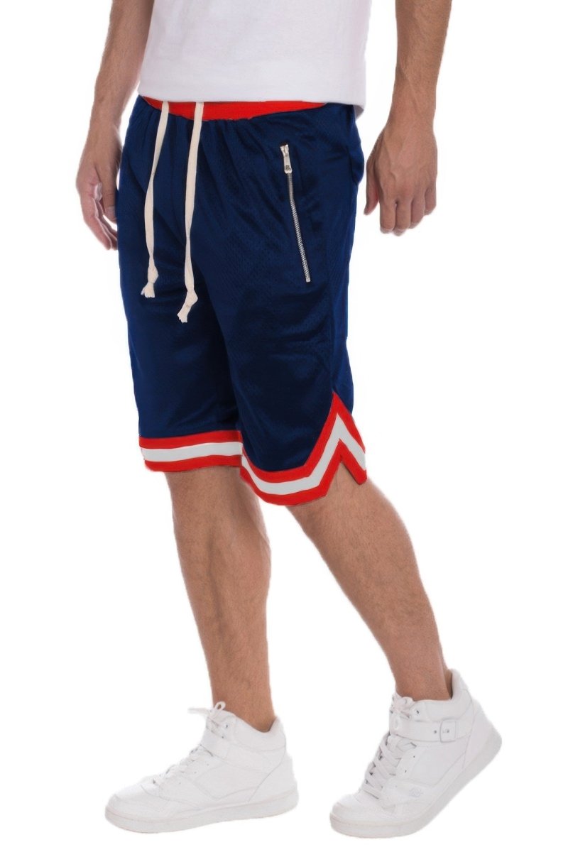 Navy shorts with red and white accents worn by a person on a white background